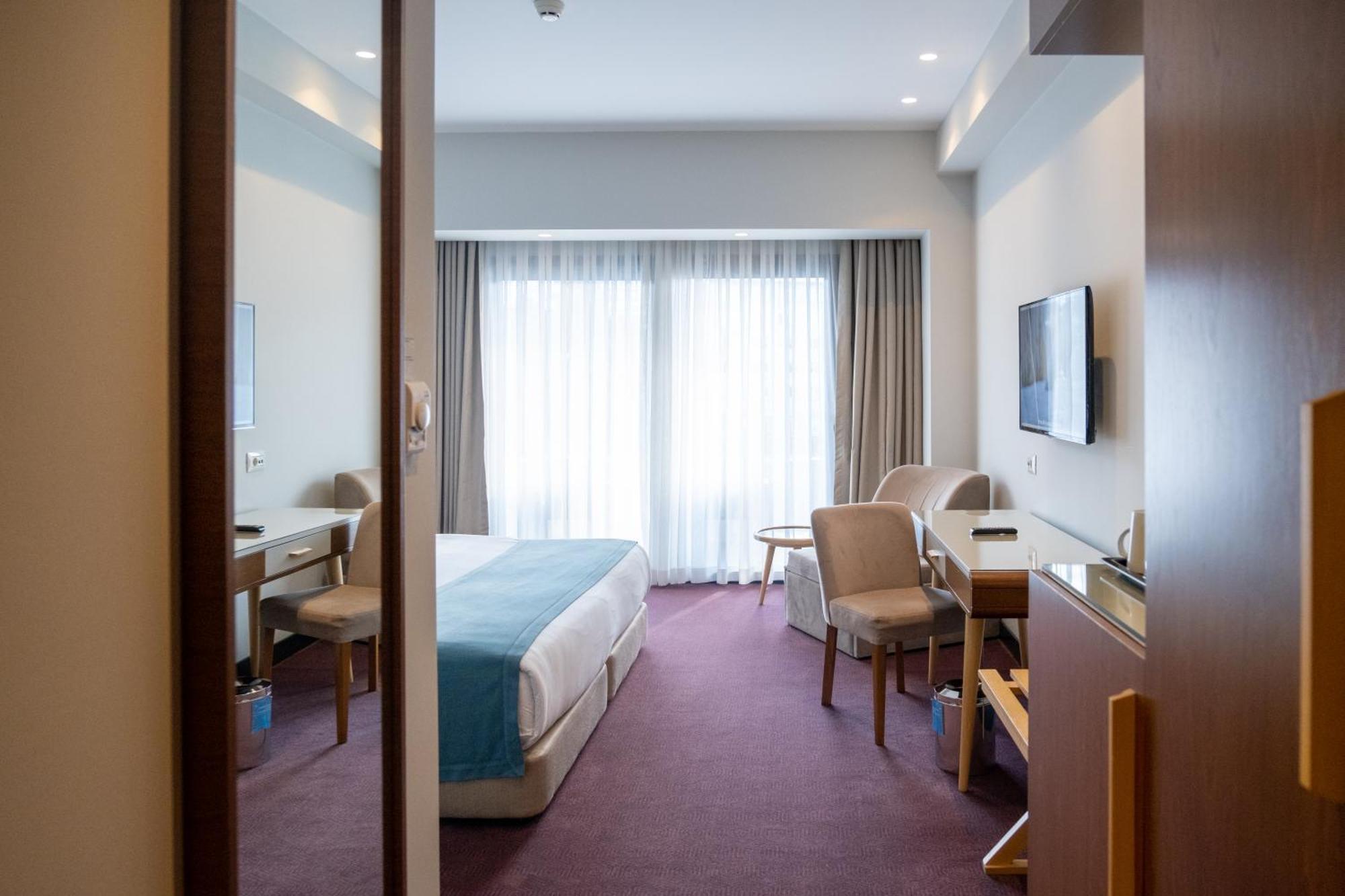 Ramada Plaza &